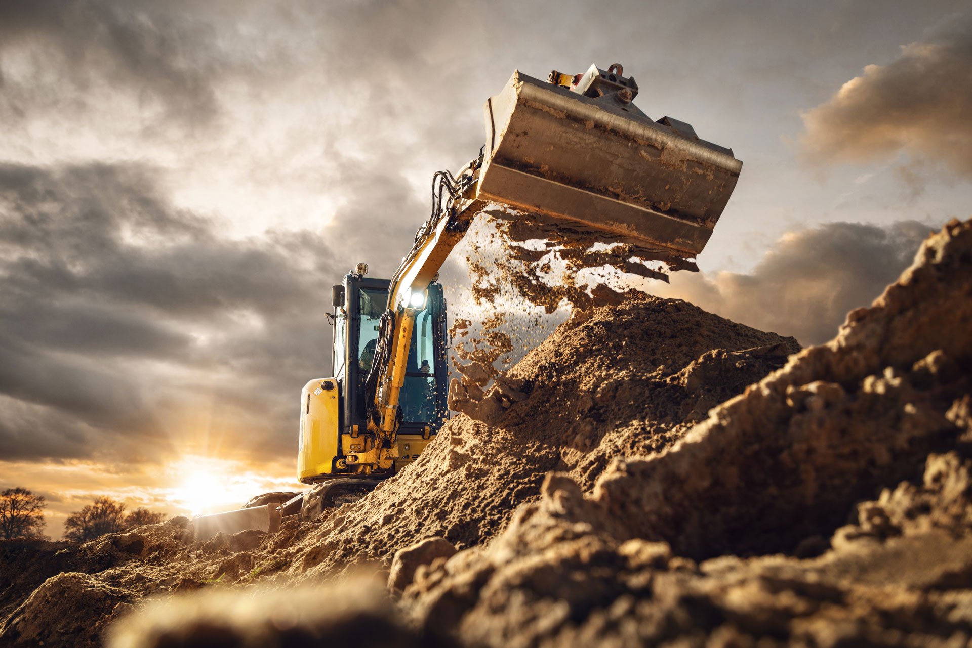 Excavator-Backlit-WorkLight-Digging-[iStock-1477166837]